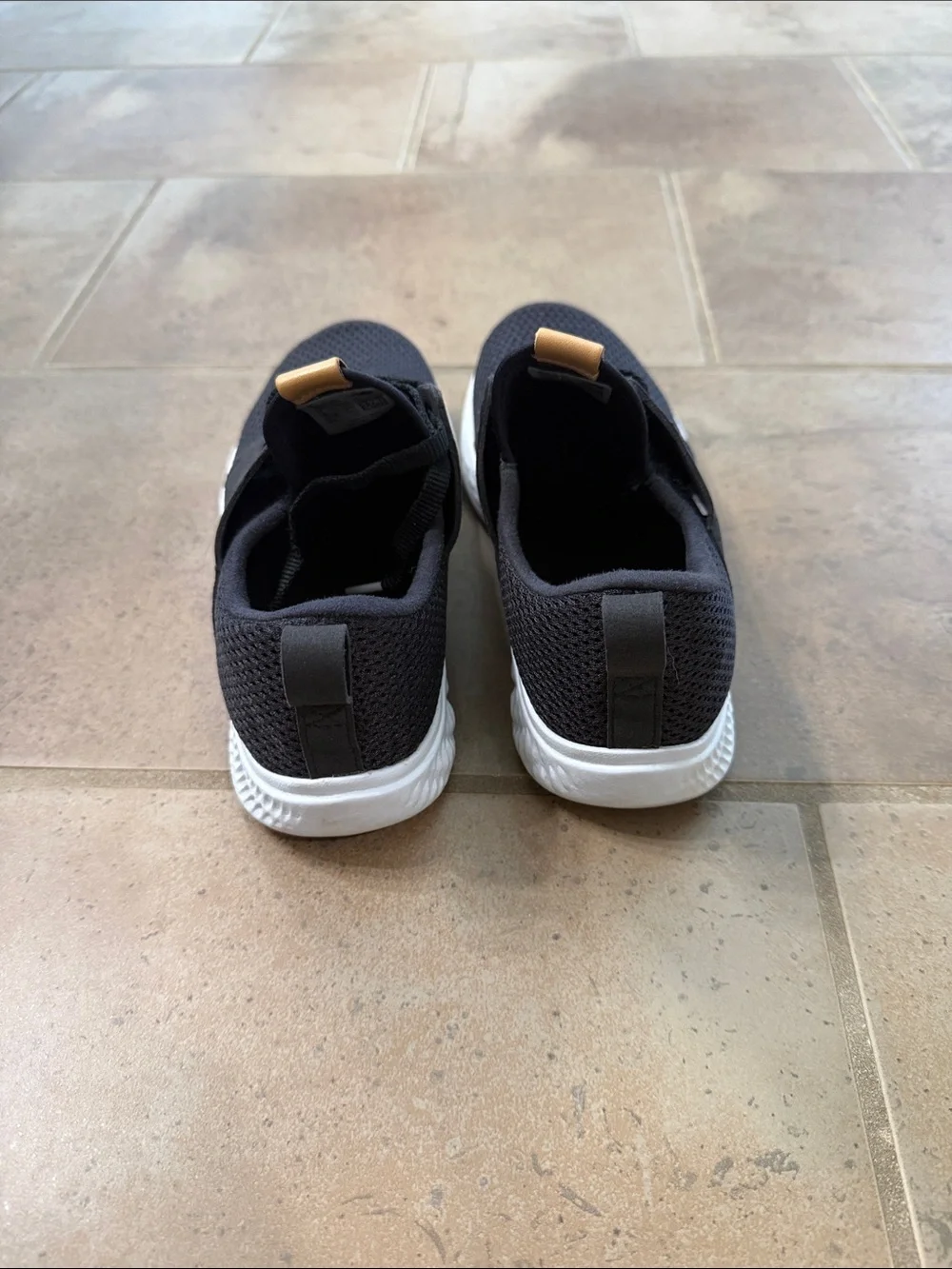 Reposhing—- New Balance Black Knit Sneakers with Brown Accents